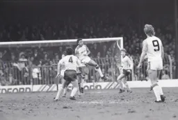 Paul Elliott with a defensive header