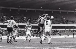 Wolves keeper John Burridge fists the ball away