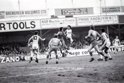 Paul Elliott rises high to head towards goal