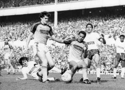 Trevor Aylott and Brian Stein cause the Spurs defence an anxious moment