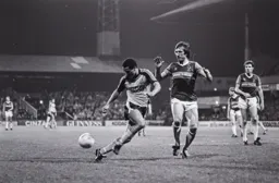 Brian Stein lets the ball come to him and glide by Hammers Billy Bonds