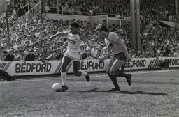 Paul Elliott beats his man down the wing