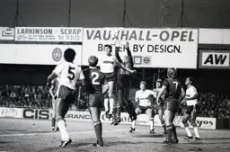 Mal Donaghy up with keeper Bruce Grobbelaar