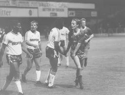 Paul Walsh commiserates with his ex team mates as the Town unluckily go down to the Champions 2-1, including a disputed penalty
