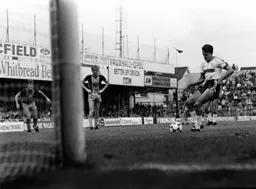 David Moss moves to take his penalty