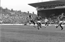 An effort from Brian Stein flashes past Paul Hart