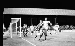 Paul Elliott holds the ball up