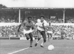 Vince Hilaire, making his league debut for the Town, had a good game, and is seen here taking on Chris Hughton