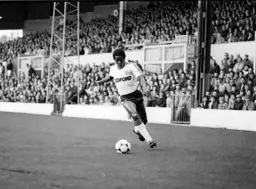 Ray Daniel crosses in front of the main stand