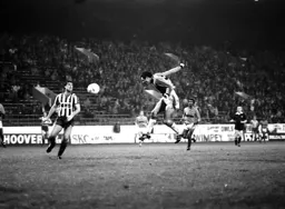 Steve Elliott heads in the Town's second goal