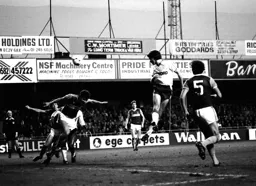 Mal Donaghy heads towards goal