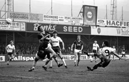 Frankie Bunn gets a shot on target as he falls to the ground