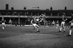 Mick Harford with a flying shot