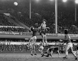 Mick Harford scores a consolation goal for the Town that set up a frantic finish to no avail aginst the future Champions