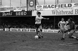 Mick Harford about to shoot