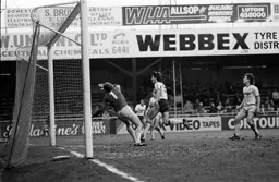 Mick Harford sees his effort go wide