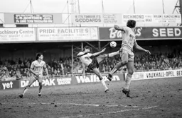 Mick Harford with an acrobatic effort