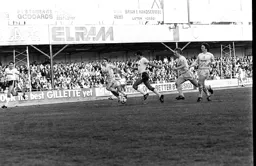 Brian Stein clears the defence