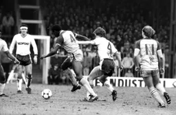 Peter Nicholas gets a tackle in