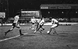 Brian Stein drives through the defence