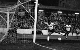 Brian Stein stretches for the ball but the open goal eludes him