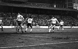 Mick Harford goes close