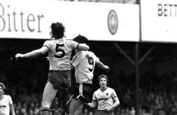 Mick Harford gets an elbow in his ear