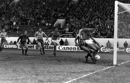 Mick Harford forces the ball over the line for the equaliser