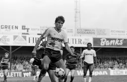 Mick Harford shields the ball