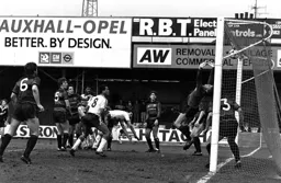 The Rangers defenders can only stand and watch as the ball geoes in for the second goal
