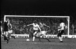 Mal Donaghy brings the ball out of defence