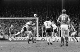 Steve Foster clears the ball