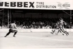 Defenders surrond Ricky Hill as he attempts a shot at goal