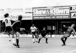Mick Harford heads the ball past Q.P.R. keeper Peter Hucker for Town`s first goal