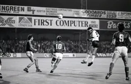 Steve Foster heads for goal