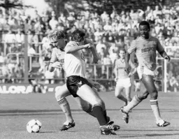 Tim Breacker sends an Oxford defender the wrong way