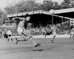 Mick Harford volleys one over the bar