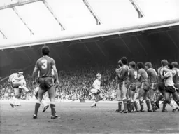 Steve Foster fires in a direct free kick, but the Liverpool wall does its job