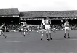 Mick Harford shoots from distance