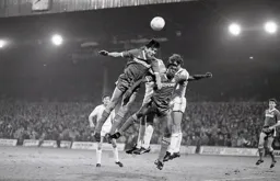Mick Harford heads for goal