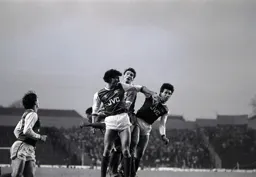 Mick Harford sandwiched between Keown and Mariner