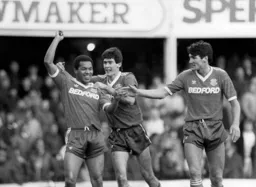 Brian Stein has just scored Town`s late winner. Mike Newell and Mick Harford look pretty happy about it too