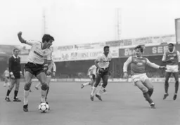Mick Harford takes on Kenny Sansom