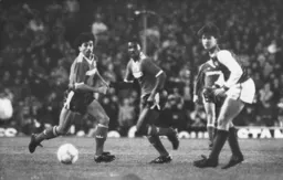 Rob Johnson and Ricky Hill keep their eyes on the ball