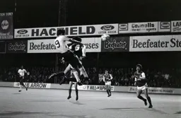 Mick Harford heads for goal