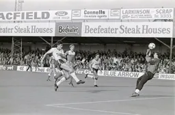 Mick Harford sees his shot tipped over