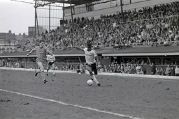 Mitchell Thomas about to cross