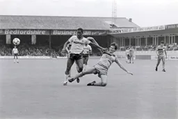 Emeka Nwajiobi is tackled by Glenn Roeder