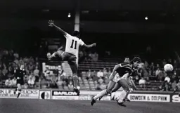 Emeka Nwajiobi heads the ball down