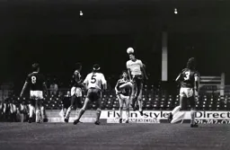 The ball goes just too high for Mike Newell